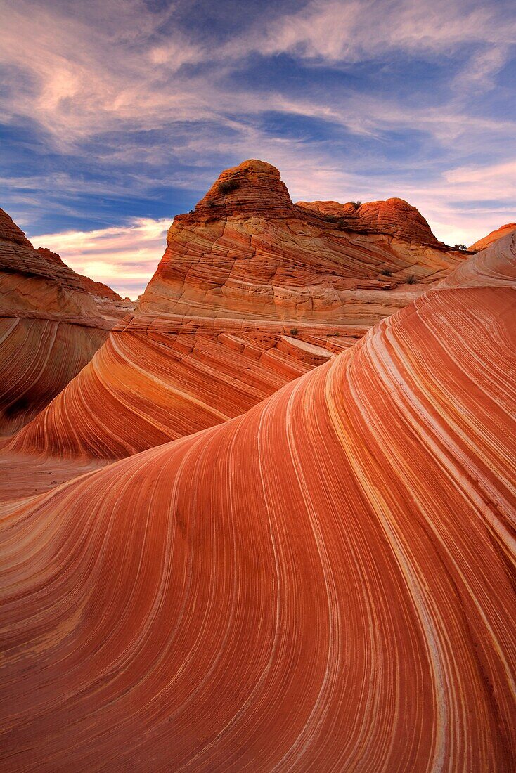 Sandstone formation in Coyote Buttes north area called wave illuminated by sunset light