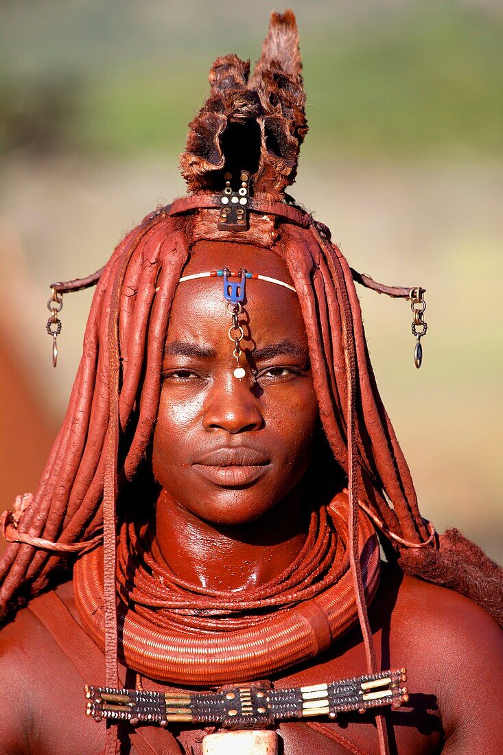 Himba woman with the typical ornaments, near to Epupa Falls, Kaokoland, Namibia