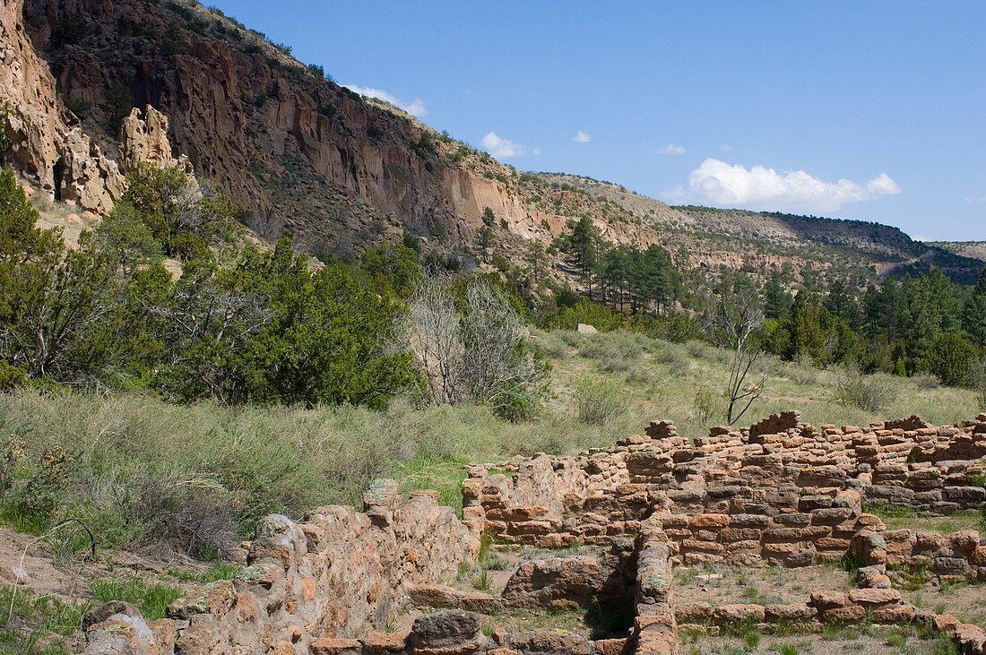 Main Loop trail showing the archeology features along Frijoles Canyon at Bandelier National Monument in New Mexico Tyuonyi Pueblo walls