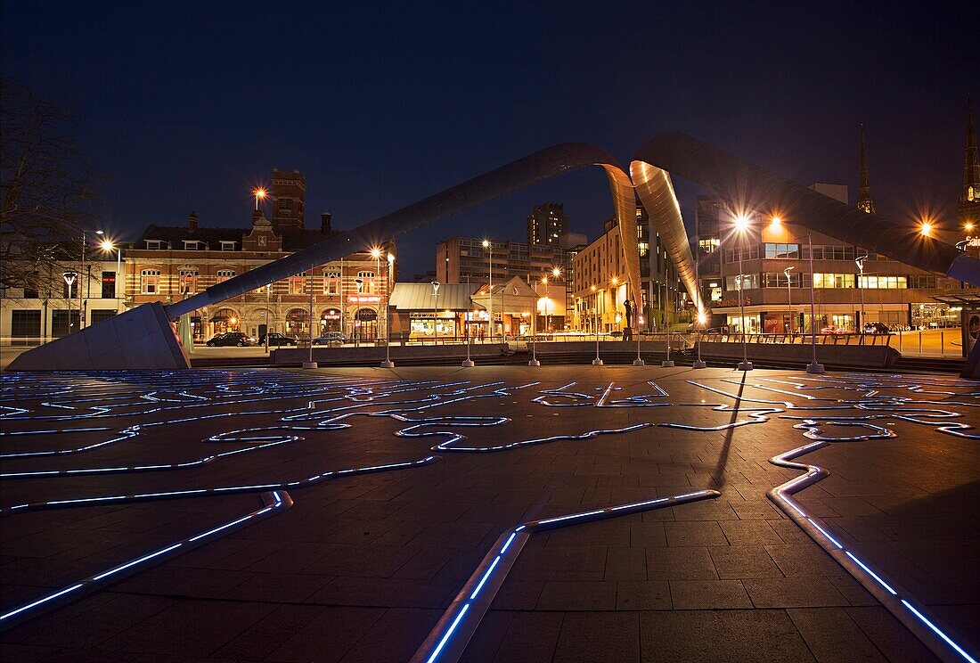 The Millennium Place at night showing the Whittle Arch and Time Zone Clock, Coventry, West Midlands of England