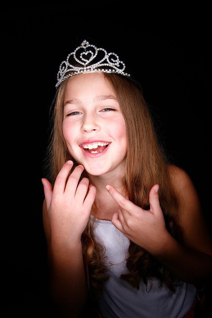 Smiling Young Girl Wearing Tiara