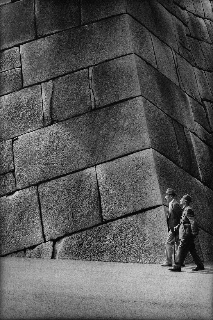 Two Men by Imperial Palace Stone Wall, Tokyo, Japan