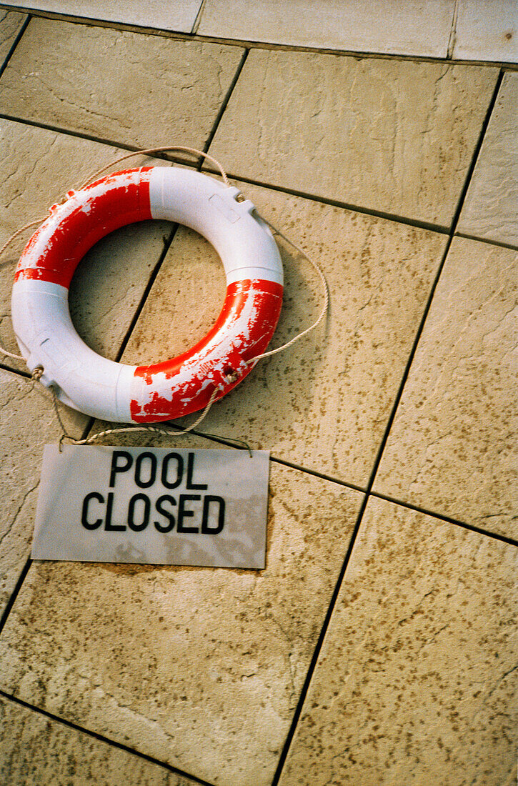 Pool Closed Sign and Life Presever