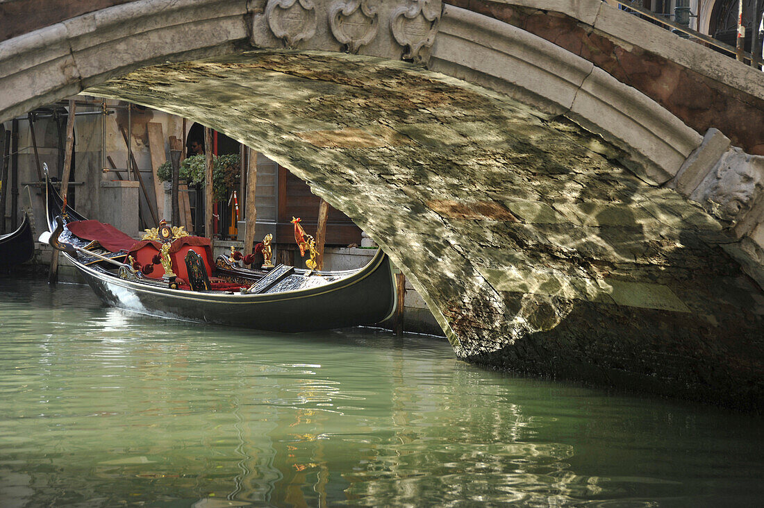 Empty gondola, bridge, Venice, Italy