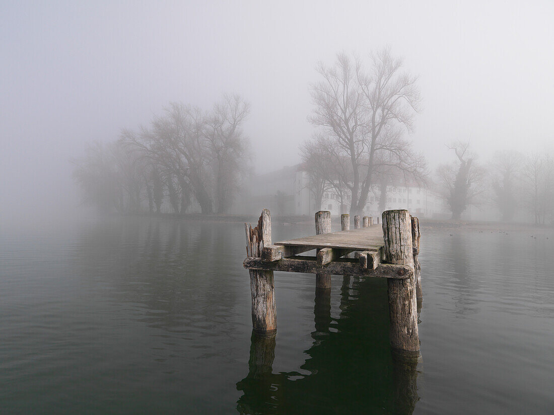 Old pier at Frauenchiemsee, Fraueninsel, Chiemgau, Bavaria, Germany