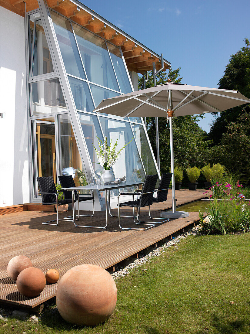 Modern private house with terrace, pond and garden furniture, near Bad Aibling, Bavaria, Germany