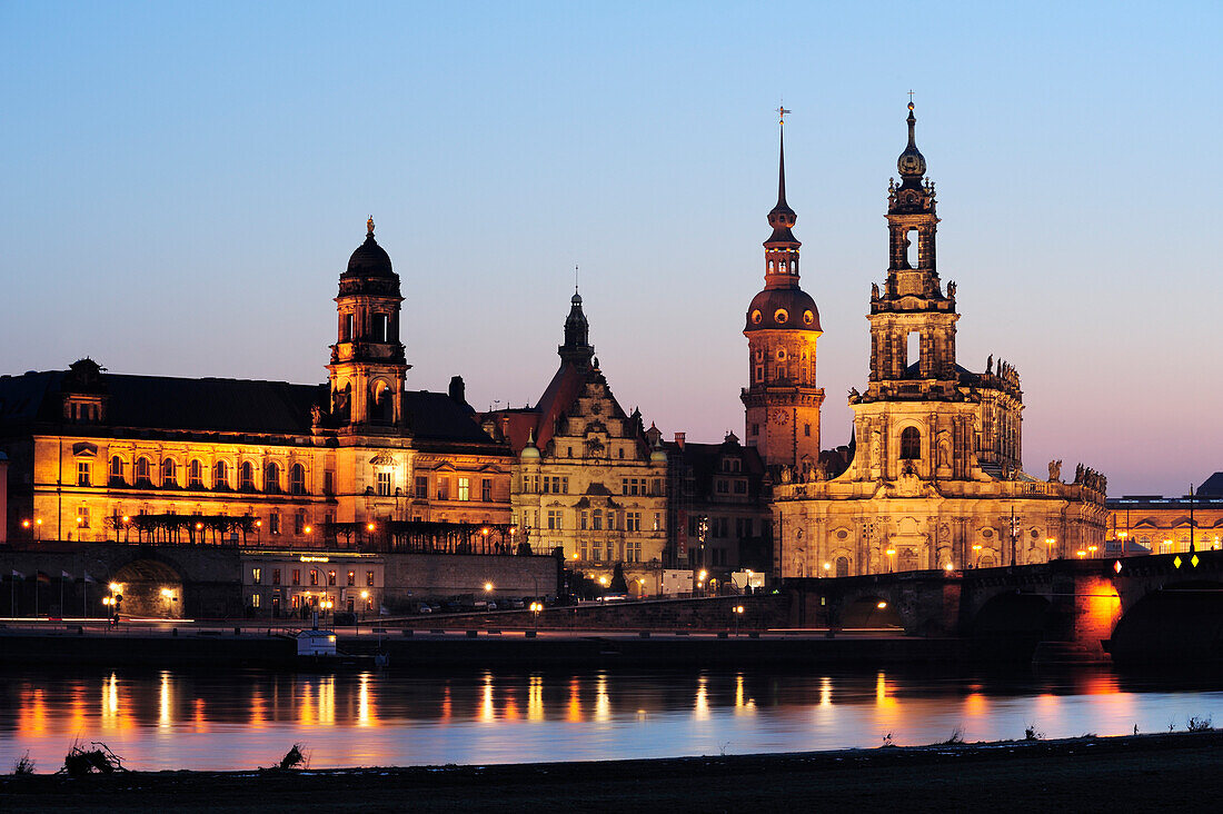 Illuminated city of Dresden with Staendehaus, Georgentor gate, Dresden castle and cathedral, river Elbe in the foreground, Dresden, Saxony, Germany, Europe