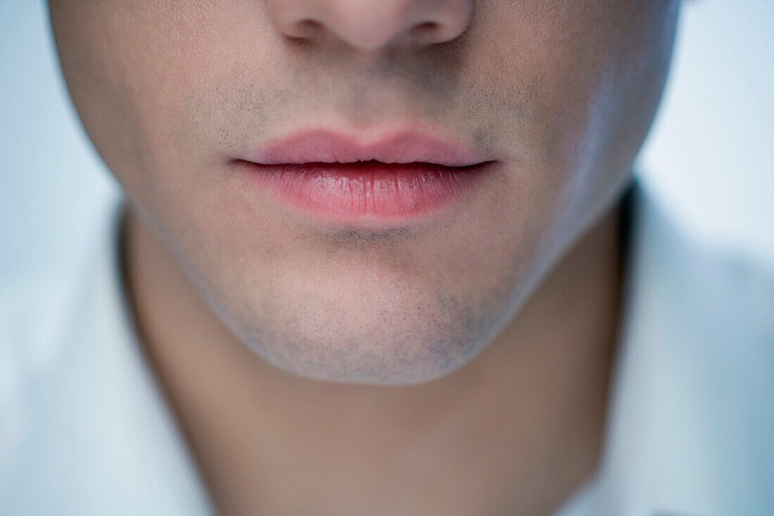 Young man's mouth, close-up