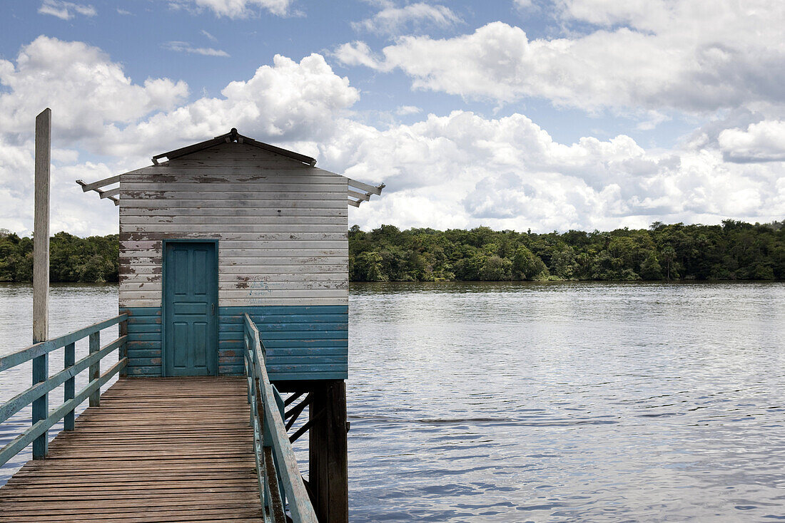 South America, Amazon, stilt house on river