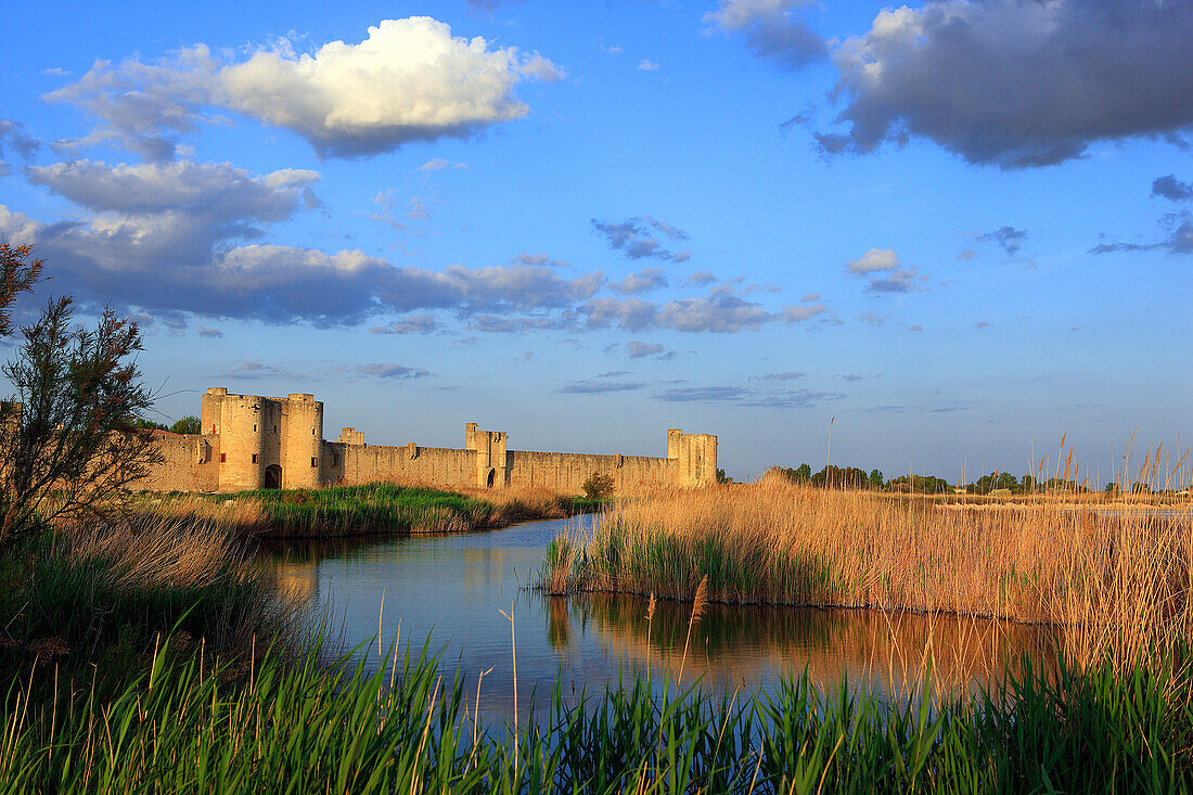 France, Languedoc, Gard, Aigues Mortes, ramparts at sunset, Camargue marsh