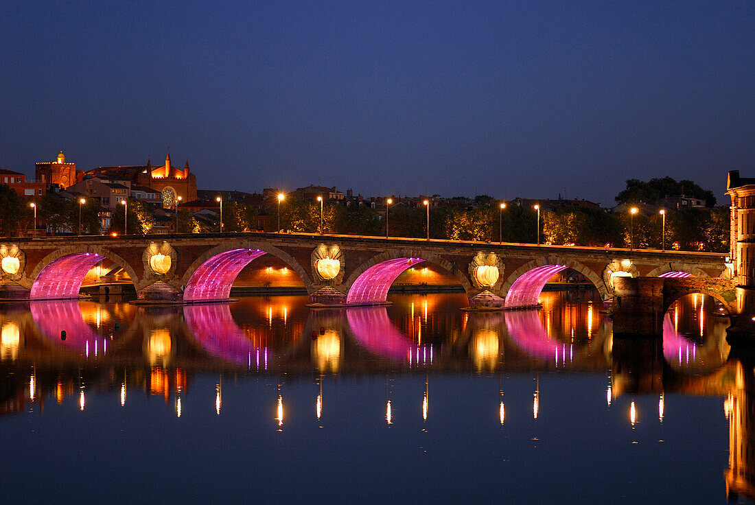 France, Midi-Pyrénées, Haute-Garonne, Toulouse by night, illuminated bridge over the river Garoone