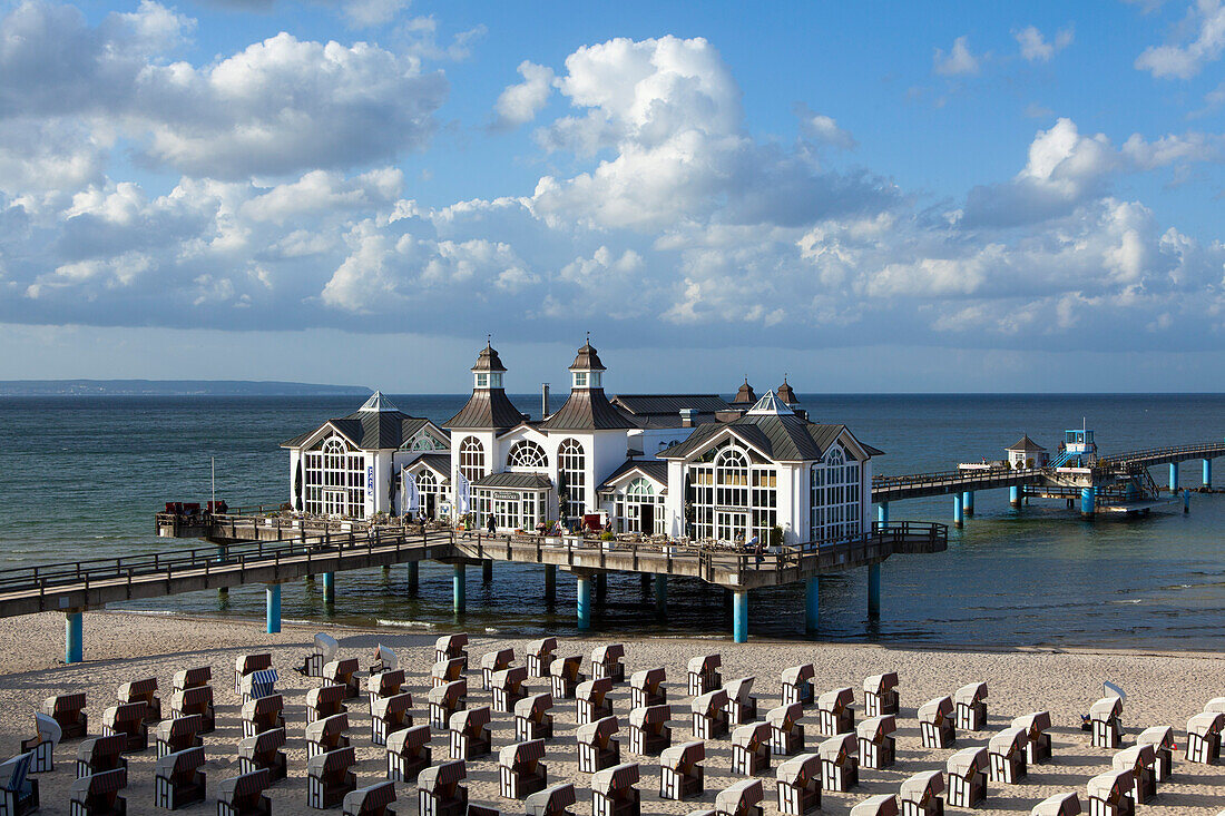 Clouds over the pier and beach, Sellin seaside resort, Ruegen island, Baltic Sea, Mecklenburg-West Pomerania, Germany