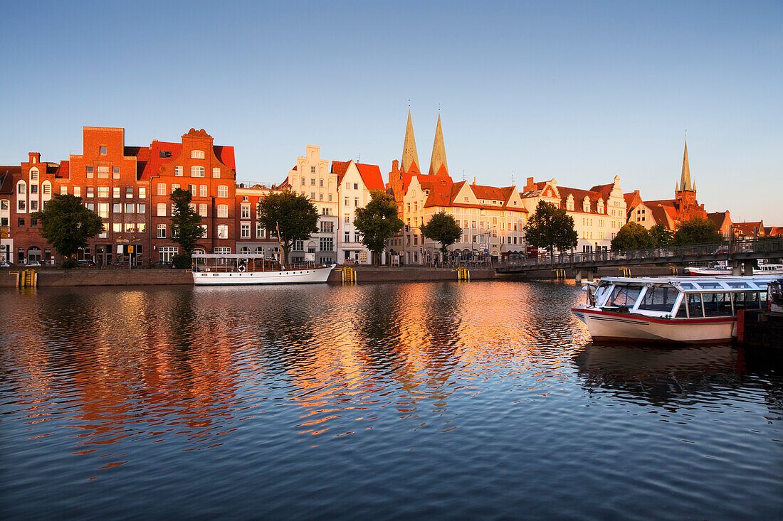 Houses with stepped gables at Holsten harbour, St Mary´s church and church of St Petri, Hanseatic city of Luebeck, Baltic Sea, Schleswig-Holstein, Germany