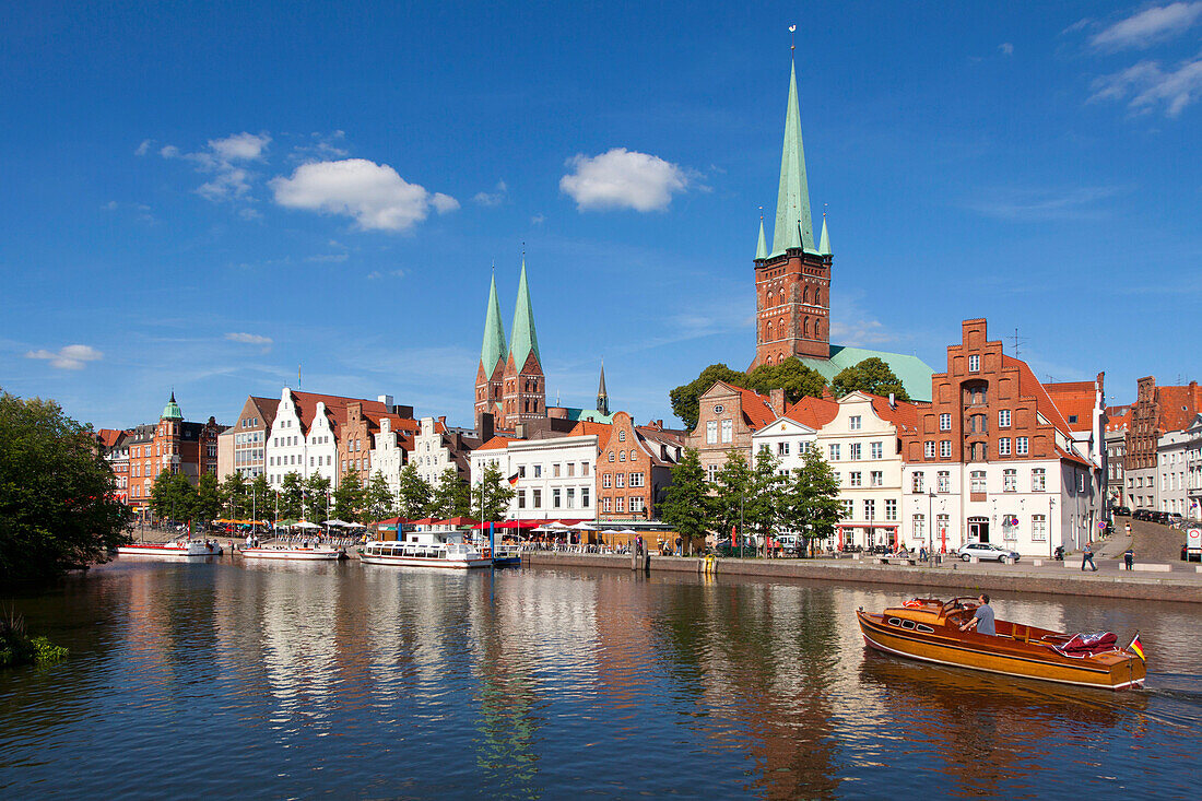 View over river Trave to old town with St. Mary' s church and church of St. Peter, Hanseatic City of Luebeck, Schleswig Holstein, Germany