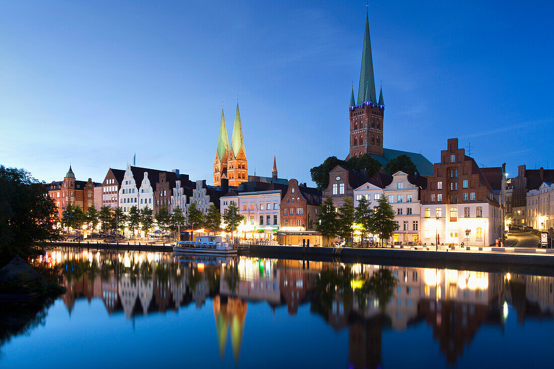 View over river Trave to old town with St Mary's church and church of St. Peter, Hanseatic City of Luebeck, Schleswig Holstein, Germany