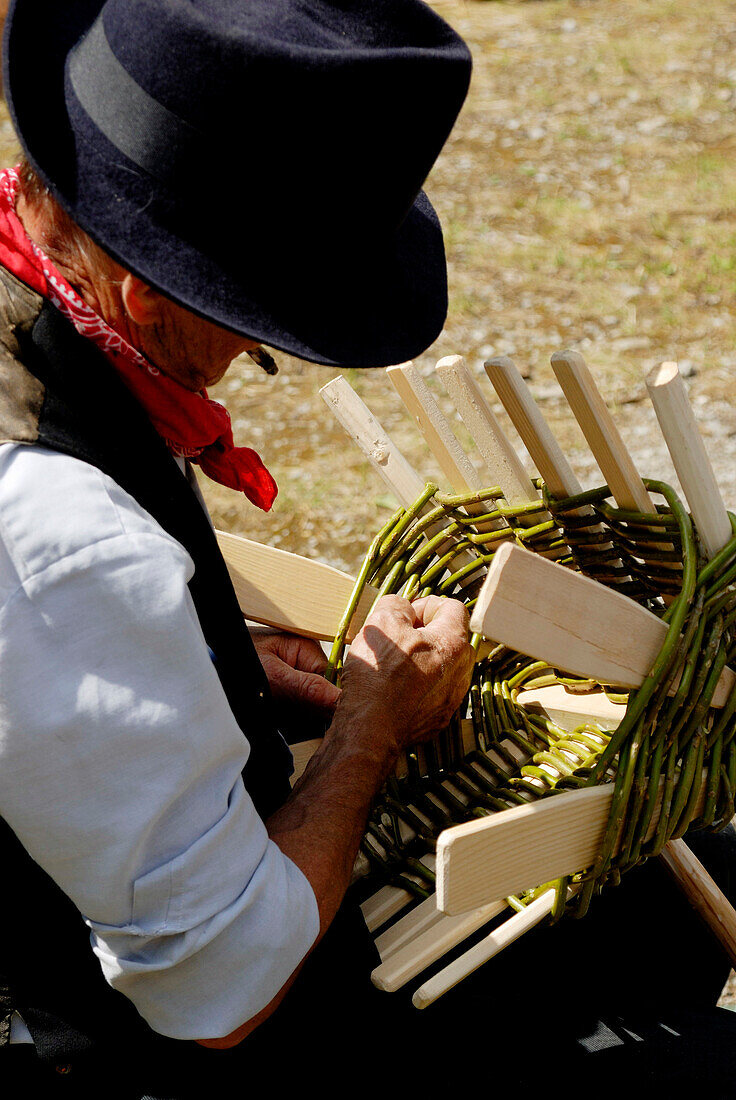 France, Alps, Haute Savoie, Grand Bornand, Old crafts feast, baskket maker a work