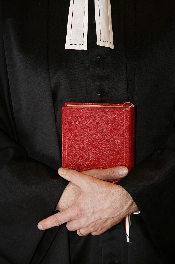 France, Paris, Protestant minister holding Bible