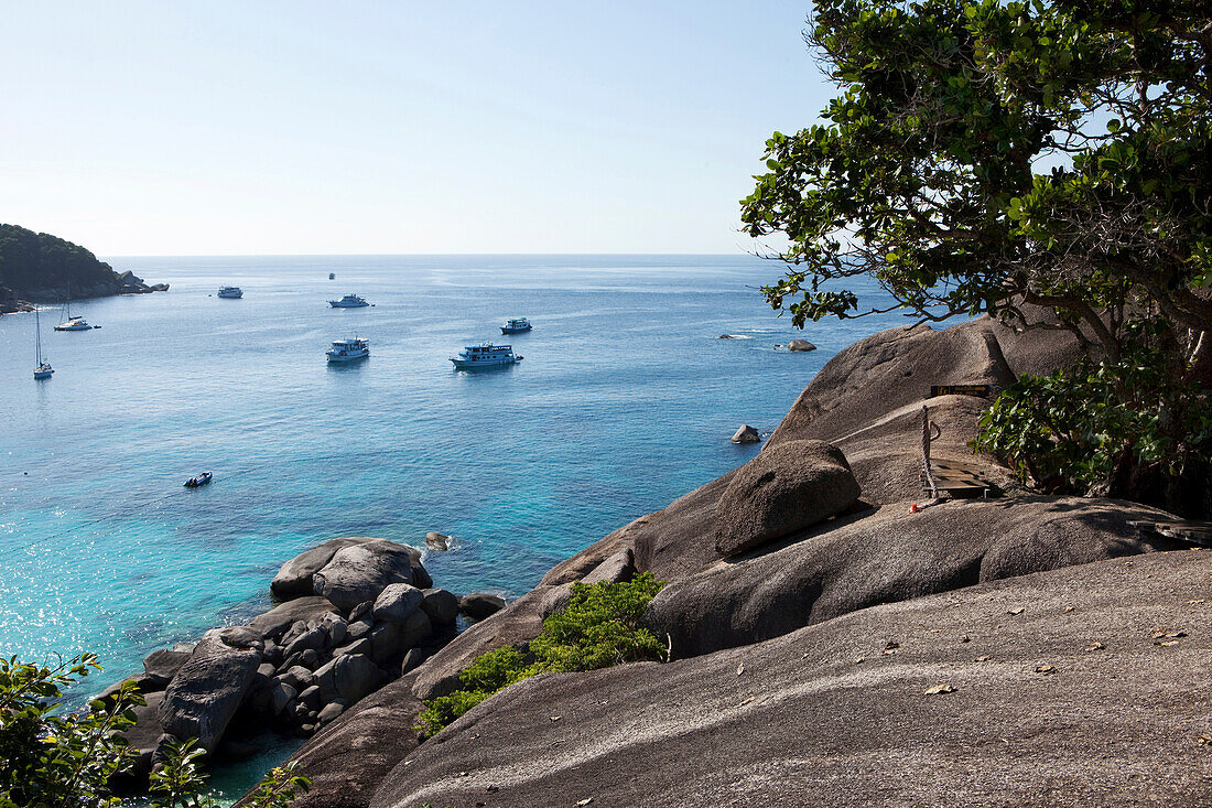 View from the top of Sail Rock down onto the sea with diving boats, Similan Islands, Andaman Sea, Thailand