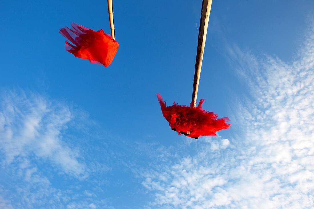 Light of a beach bar made of bamboo against blue sky, Koh Lanta, Andaman Sea, Thailand