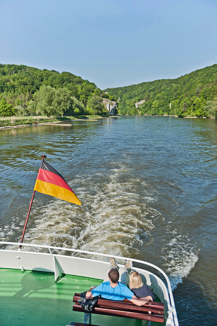 Couple on excursion boat on Danube river at Weltenburg Narrows, Kelheim, Bavaria, Germany, Europe