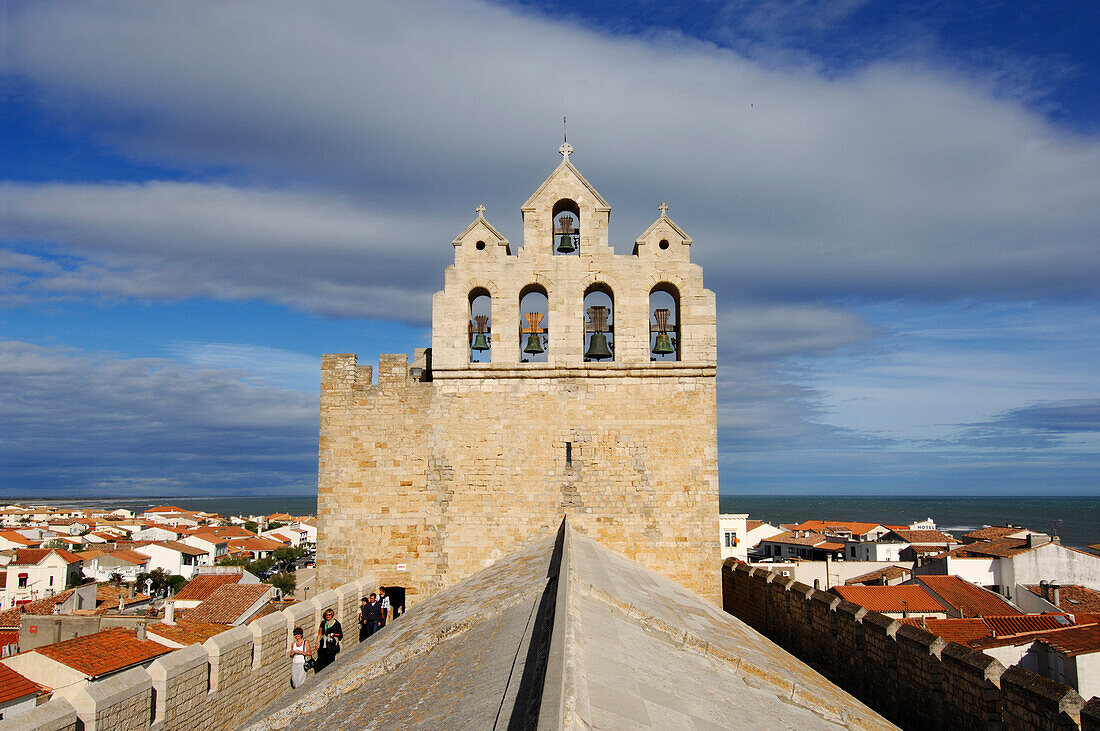 Tourists at the top of the church in Saintes Maries de la Mer, Camargue, Provence, France