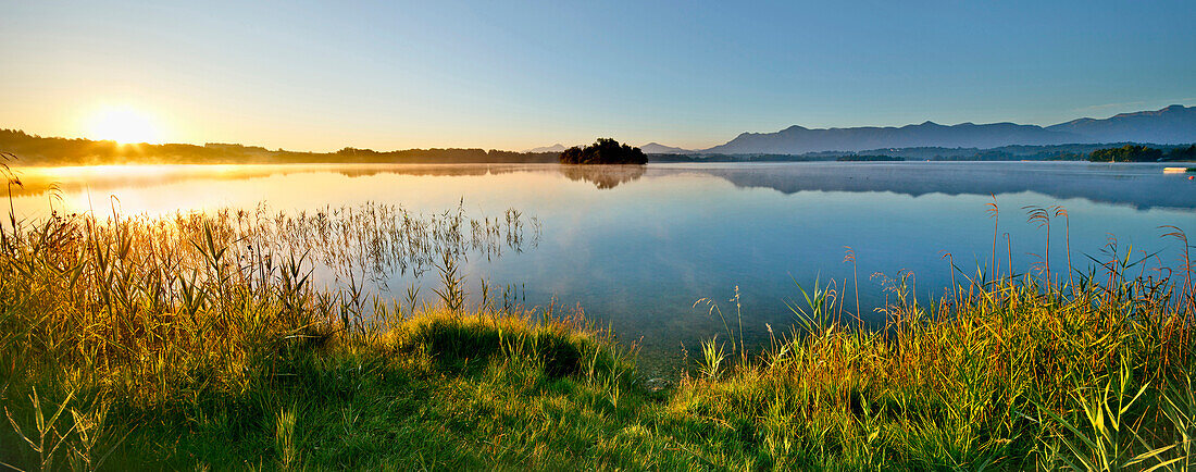 Sunrise at lake Staffelsee, Muehlwoerth island, Upper Bavaria, Germany