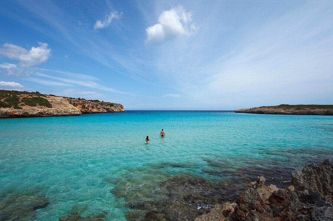People bathing in the bay, Cala Varques, Mallorca, Balearic Islands, Spain, Europe