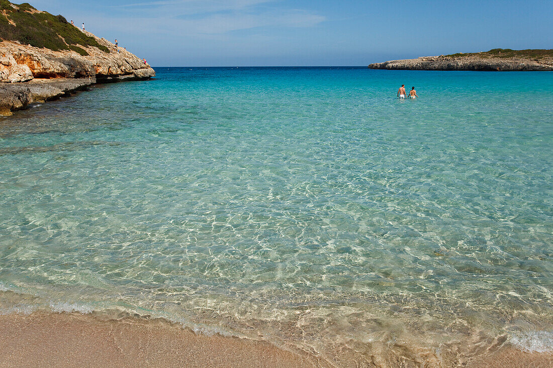 People bathing in the bay, Cala Varques, Mallorca, Balearic Islands, Spain, Europe