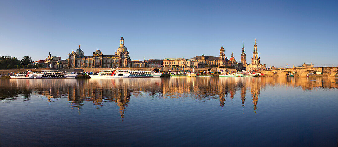 Panoramic view over the Elbe river to Bruehlsche Terrasse, University of visual arts, Frauenkirche, Staendehaus, Dresden castle, Hofkirche and Semper Opera in the evening light, Dresden, Saxonia, Germany, Europe