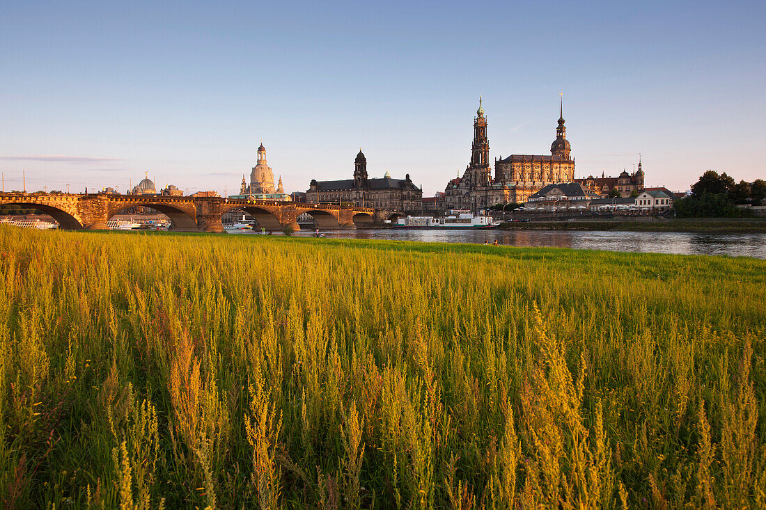 Canaletto view, view over the Elbe river to Augustus bridge, Frauenkirche, Staendehaus, Hofkirche and Dresden castle in the evening light, Dresden, Saxonia, Germany, Europe