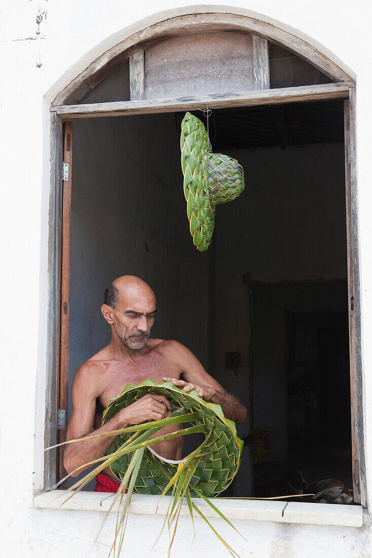 Hat braiding man in Canavieiras, Cacao Coast, State of Bahia, Brazil, South America, America