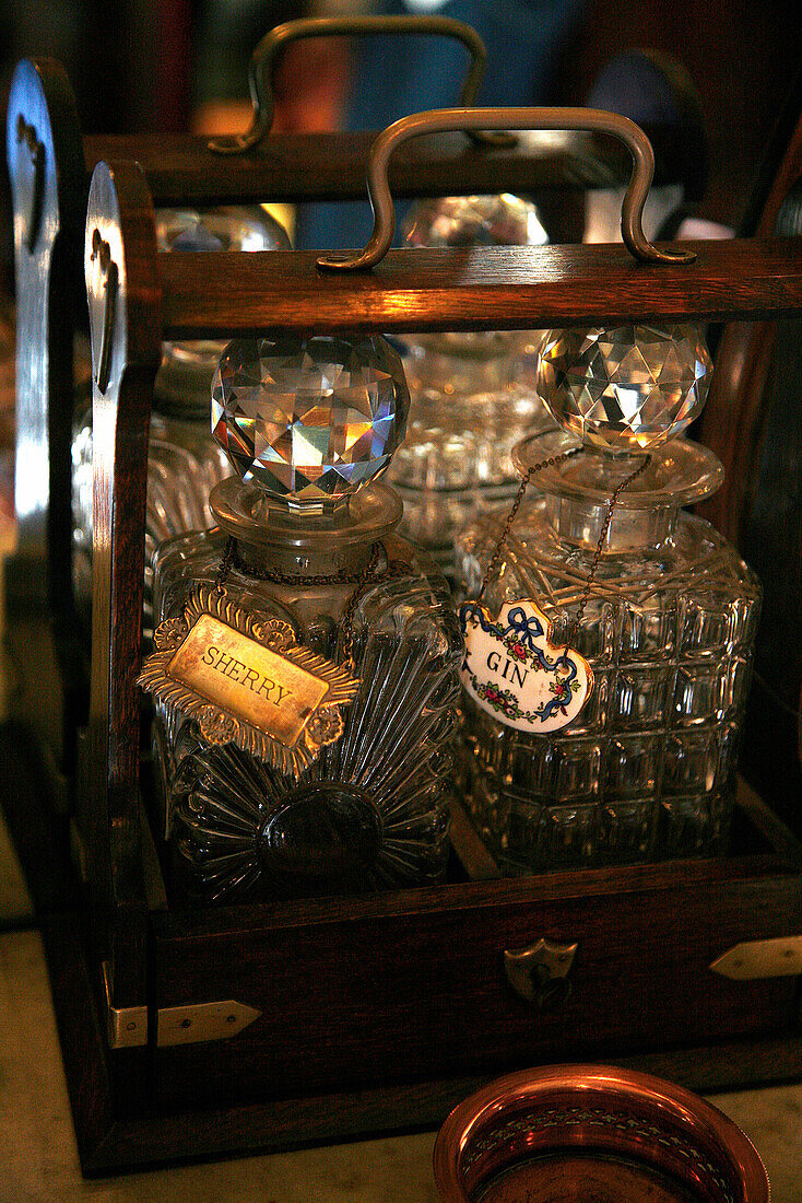 Decanters of liquor in wooden carrying case