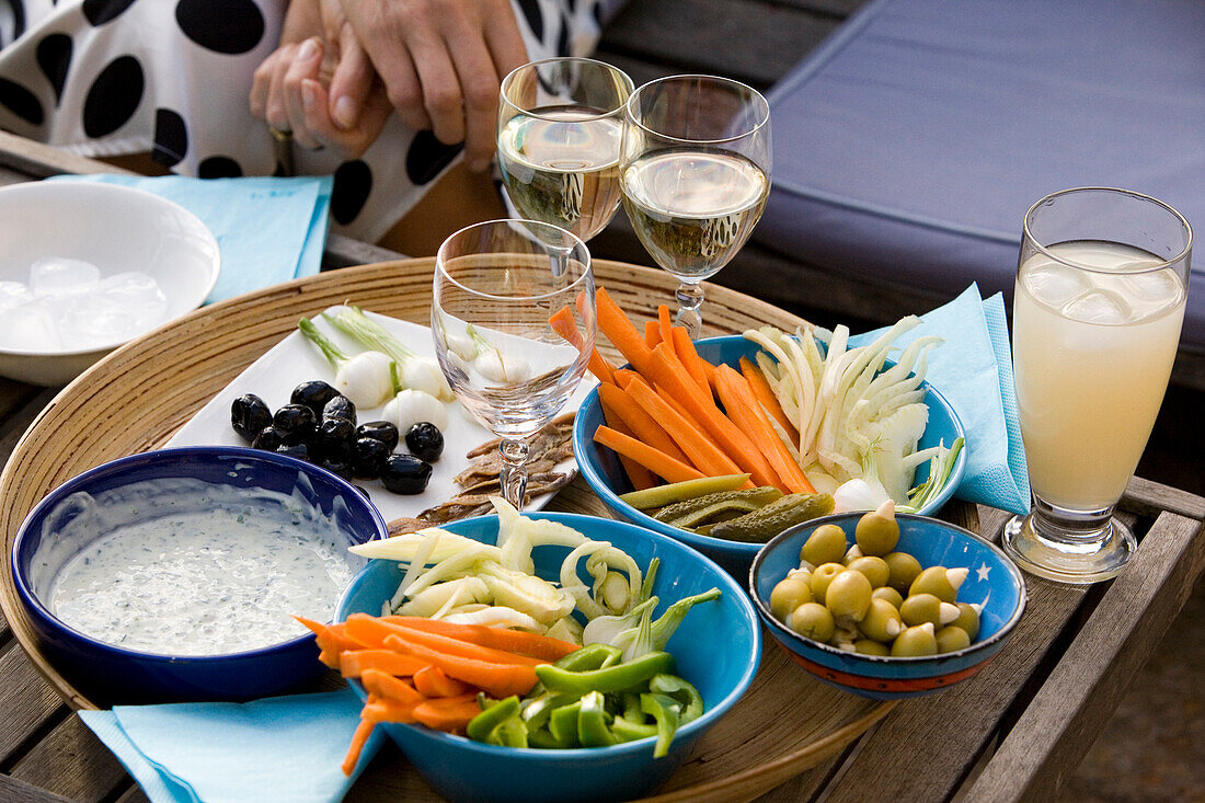 Drinks on a table, vegetables, terrace