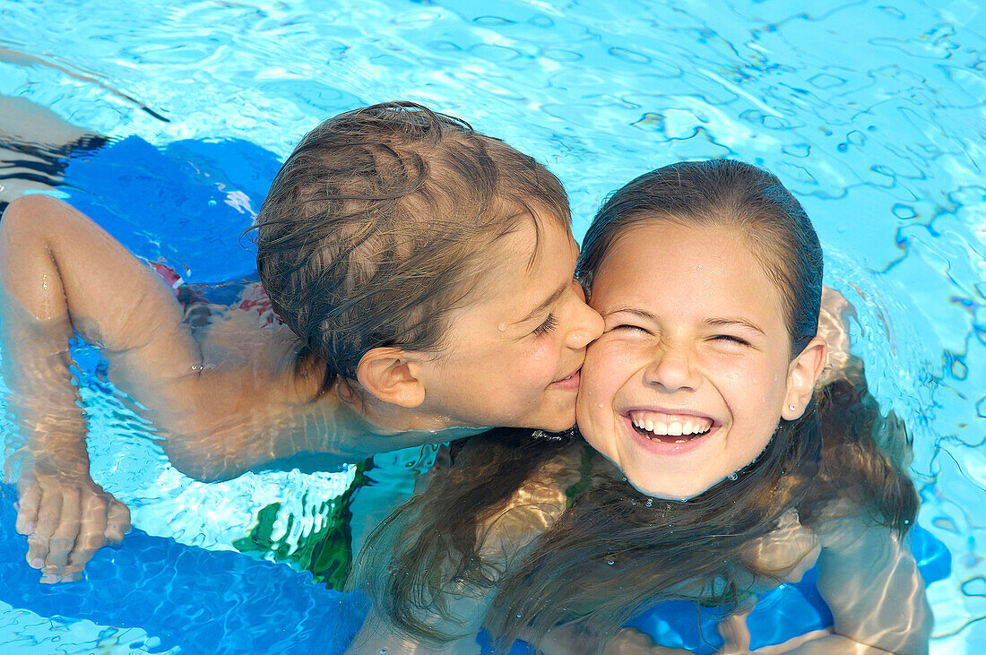 Two children in a pool