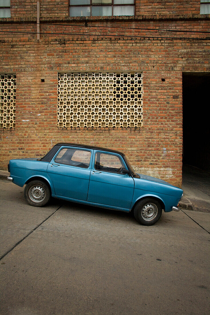 Small Blue Car Parked on Steep Road, San Gil, Colombia