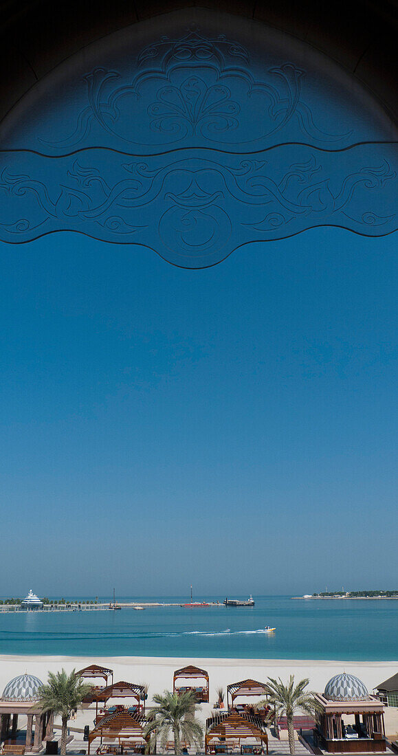 View of Beach Framed By Window at Emirates Palace Hotel, Abu Dhabi, UAE