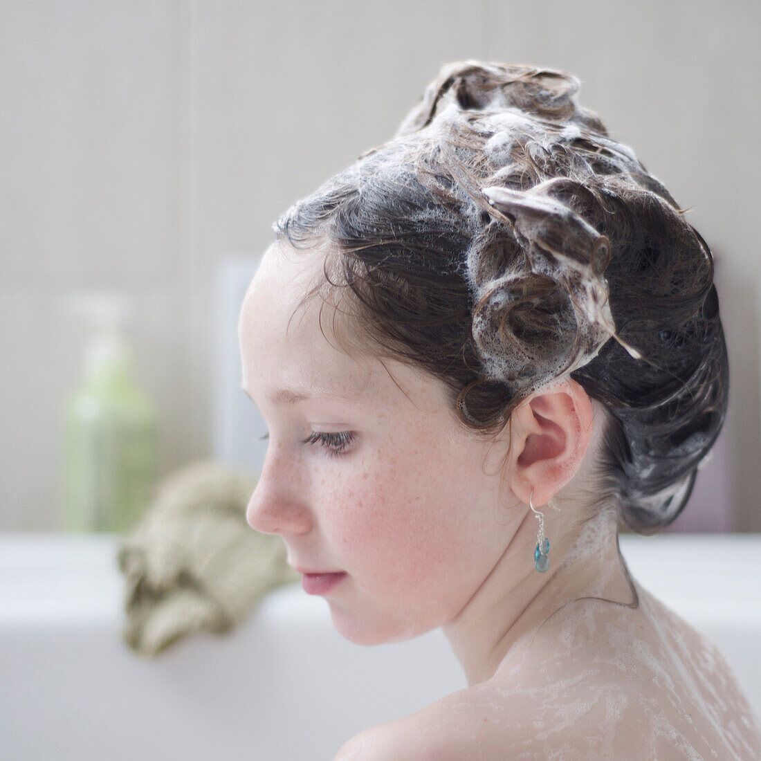 Young Girl with Soapy Hair in Bath