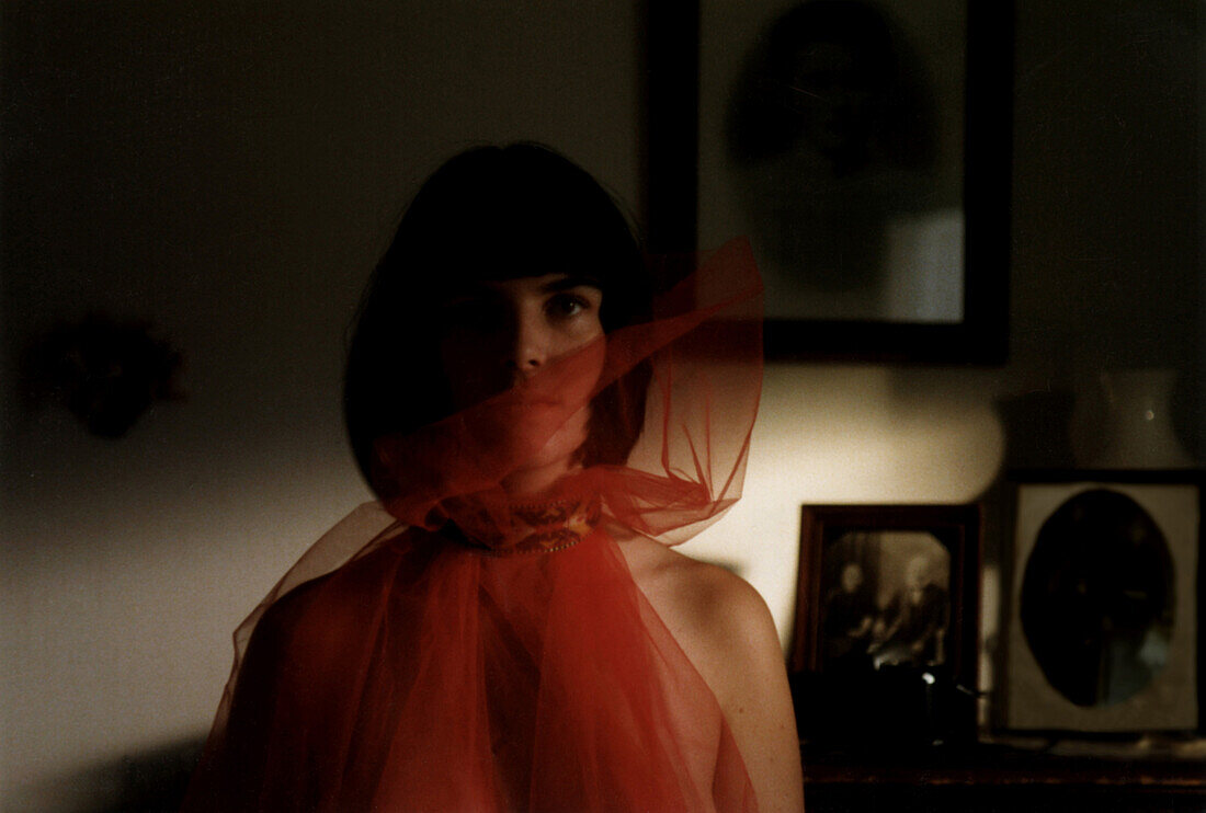 Woman Draped in Red Sheer Fabric, Portrait