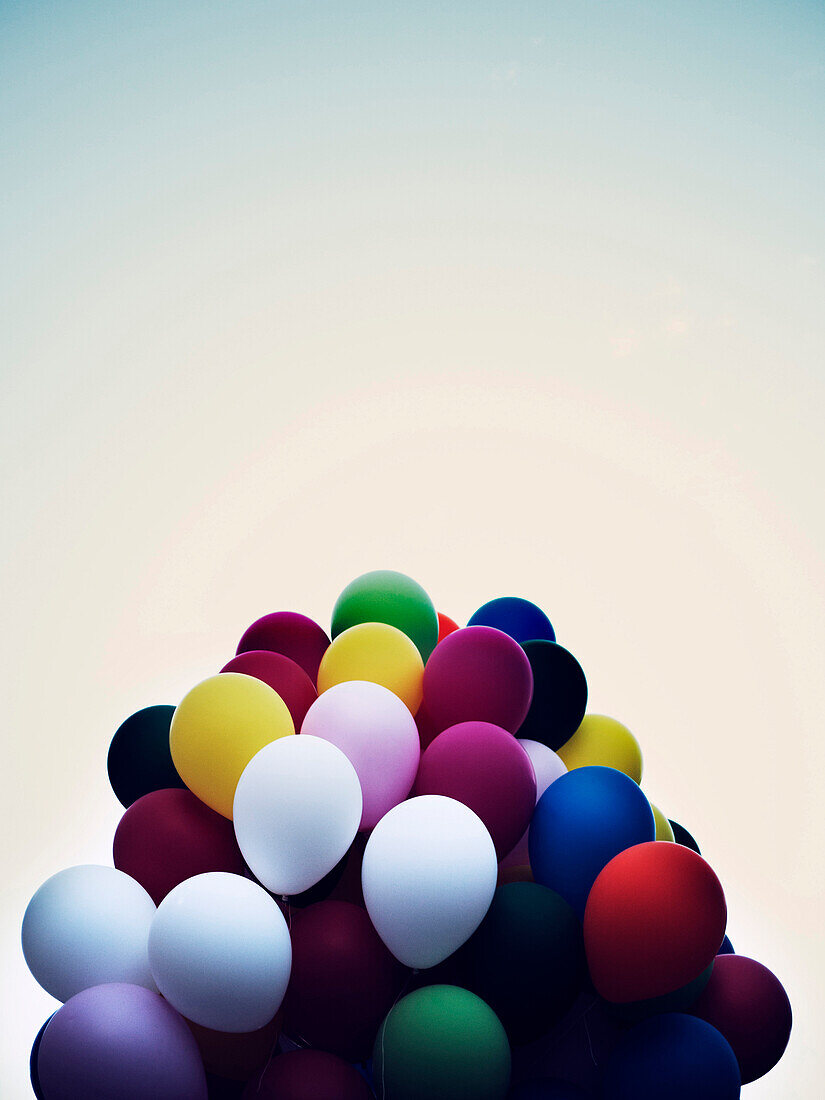 Bouquet of Colorful Balloons Against Sky
