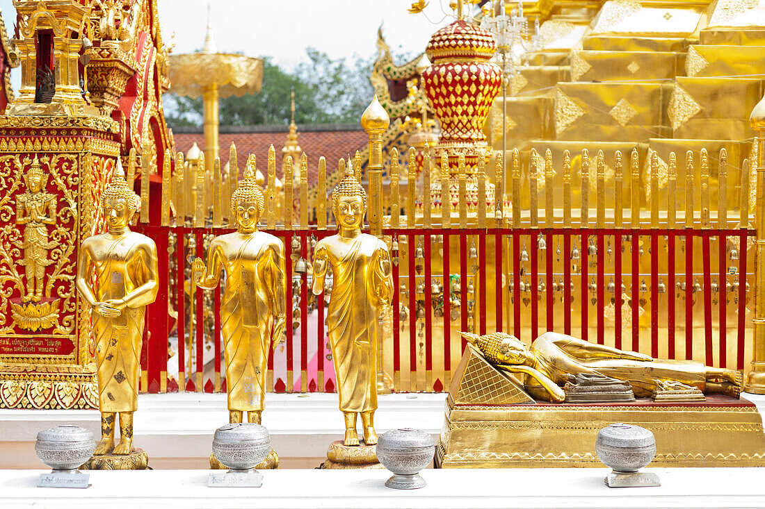 Wat Doi Suthep, golden buddha statues, standing and lying, buddhist temple on e mountain, Chiang Mai, Thailand, Asia