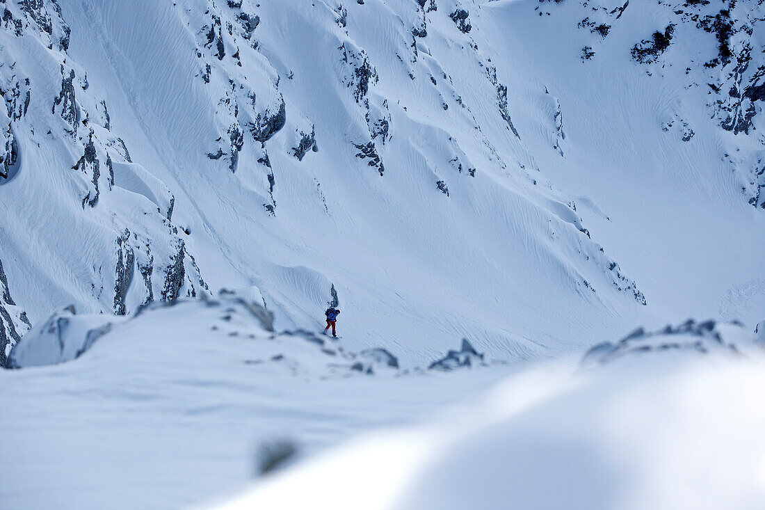 Snowboarder in deep snow, Oberjoch, Bad Hindelang, Bavaria, Germany