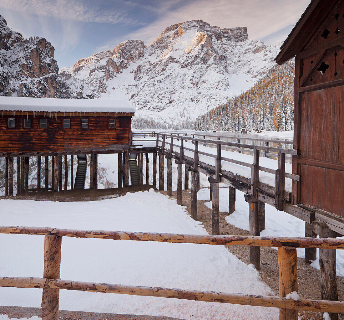 Snow covered boat house at mountain lake, Pragser Wildsee, Fanes Sennes Prags Naturpark, Seekofel, Alto Adige, South Tyrol, Italy, Europe