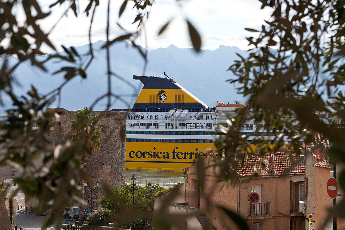 Ferry docks in the harbor of Calvi, Corsica, France
