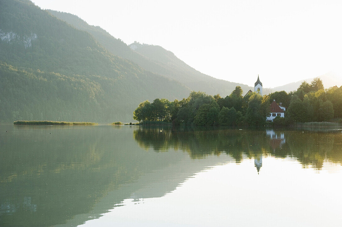 Church of St. Walburga at lake Weissensee, Fuessen, Allgaeu, Bavaria, Germany