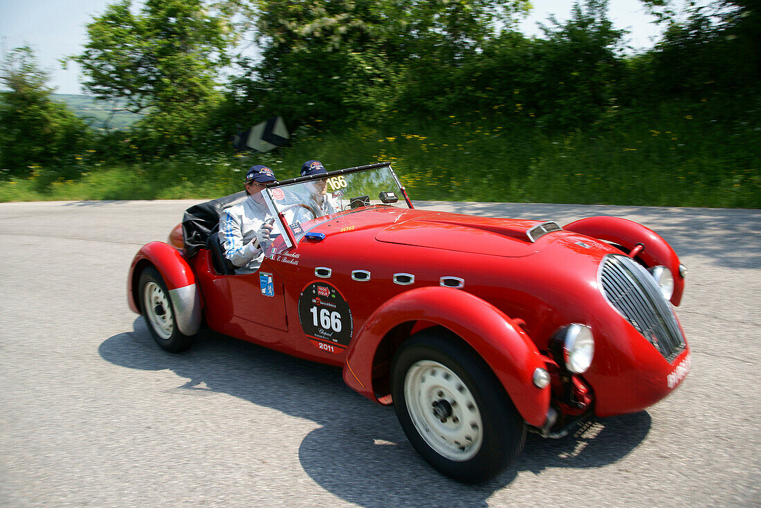 Vintage car on a country road, Monte Cerignone, Pesaro Urbino, Italy, Europe