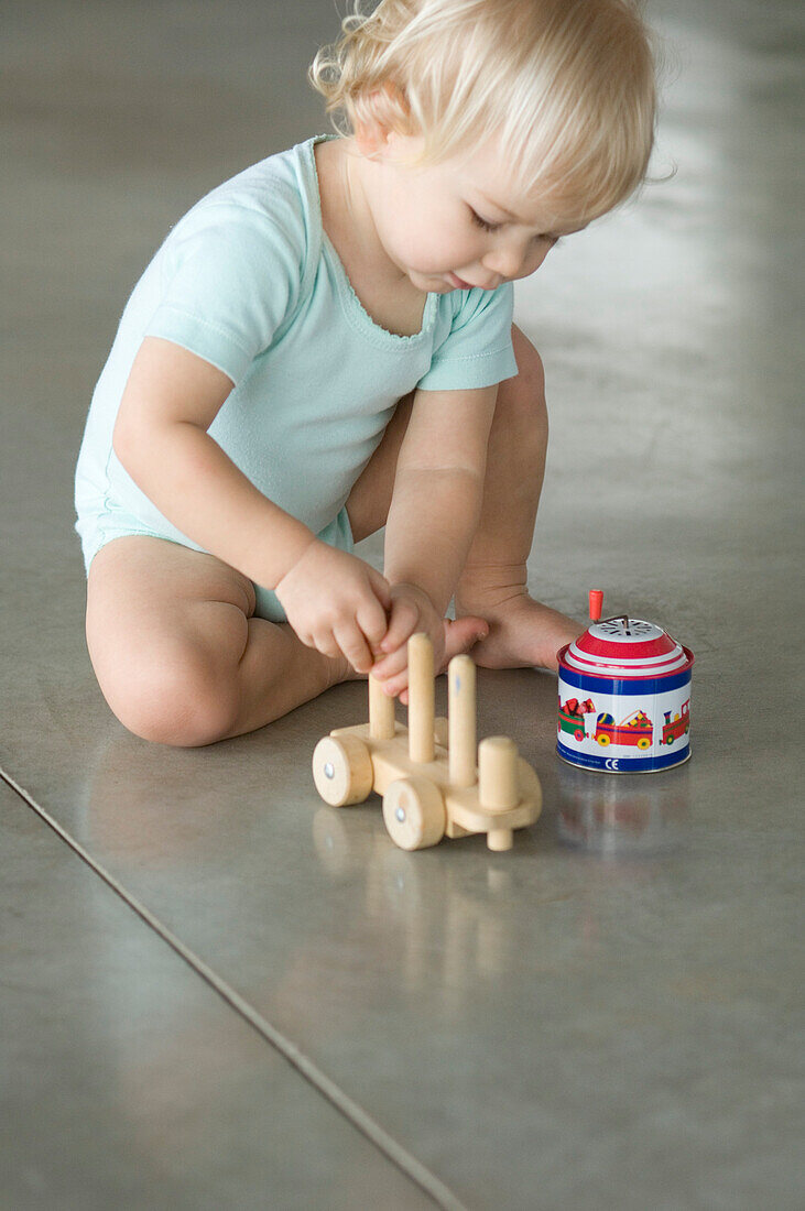 Little boy playing on the floor