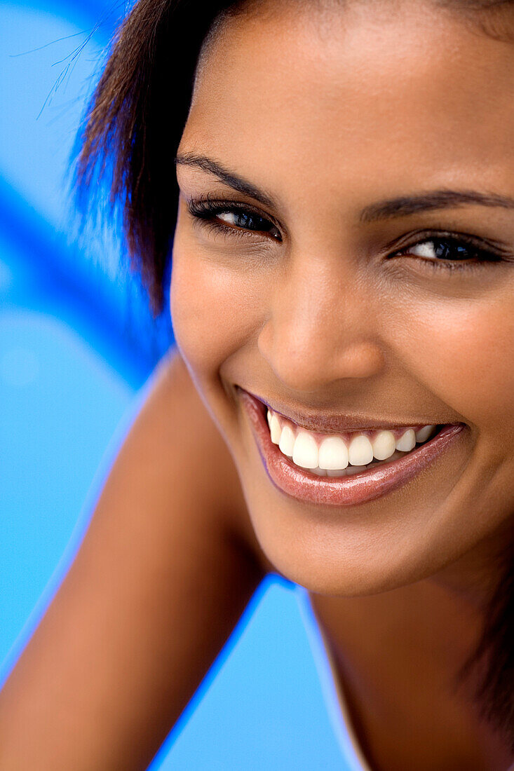 Portrait of a young woman smiling for the camera