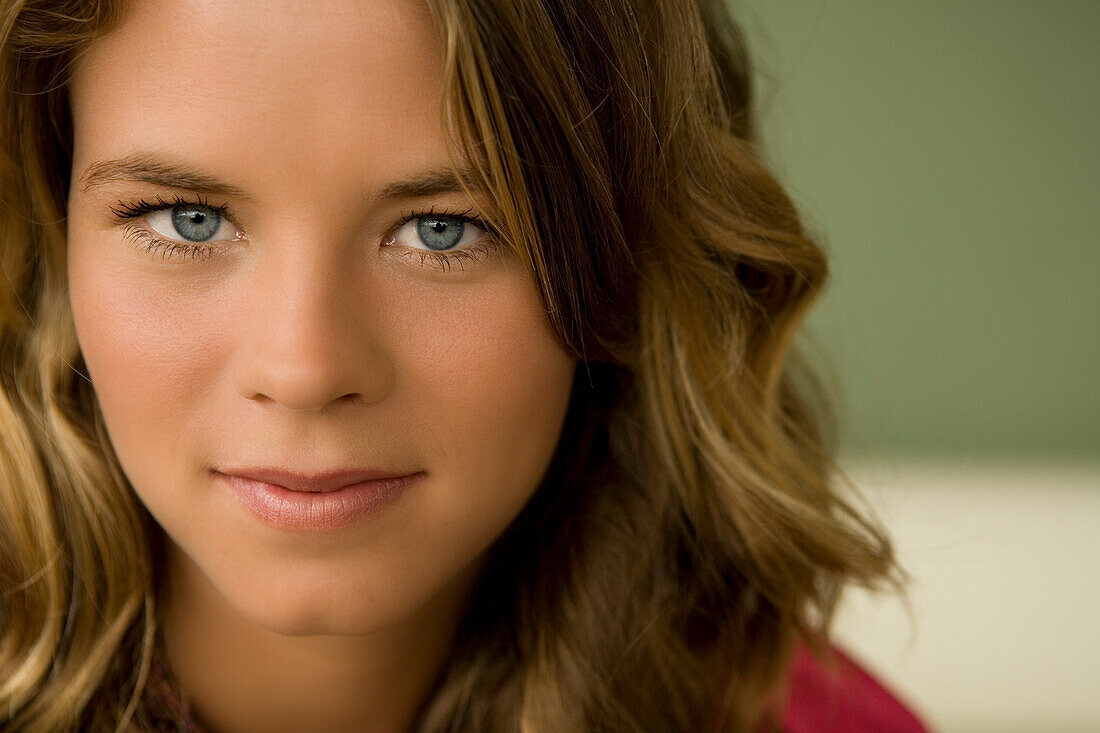 Portrait of a young woman looking at the camera