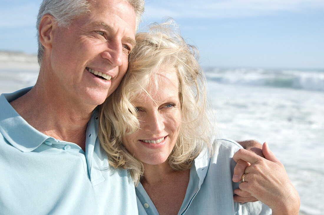 Portrait of smilin couple on the beach