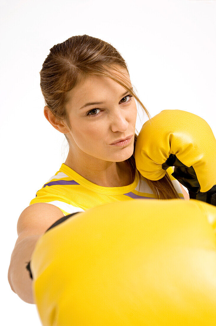 Portrait of a female boxer in a boxing stance